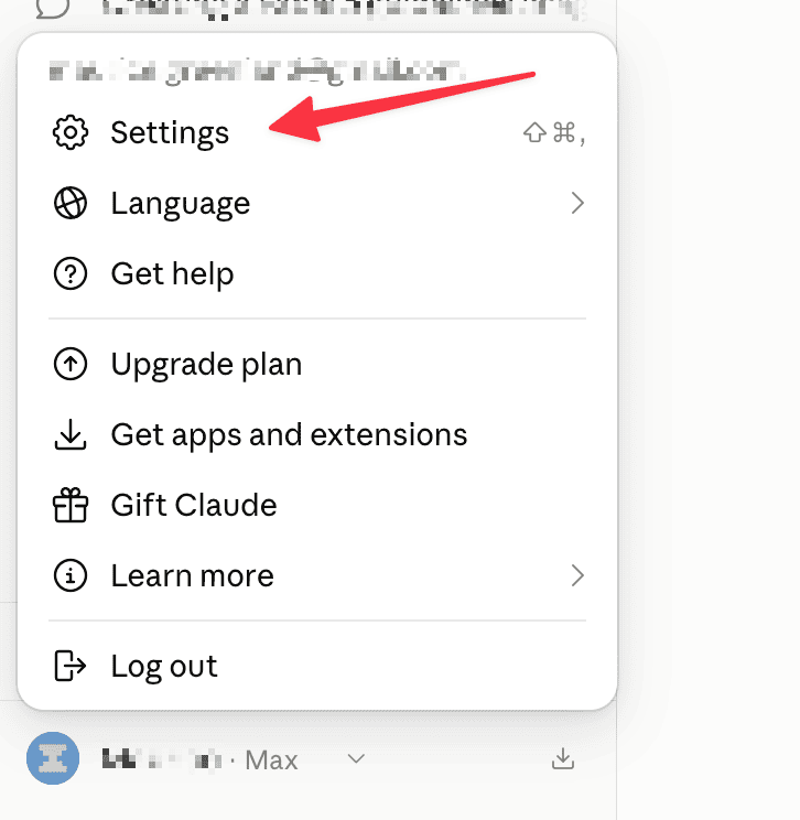The claude.ai account menu open with Settings highlighted